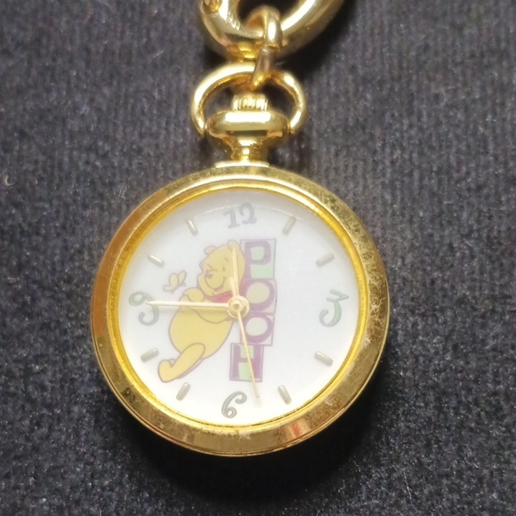 Disney Accessories - Vintage Avon Gold Winnie the Pooh Clip Pocket Watch